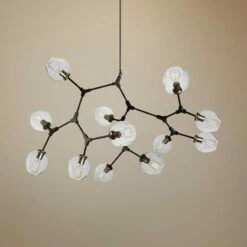 Organic 55" Wide Black And Vintage Brass 12-Light Chandelier